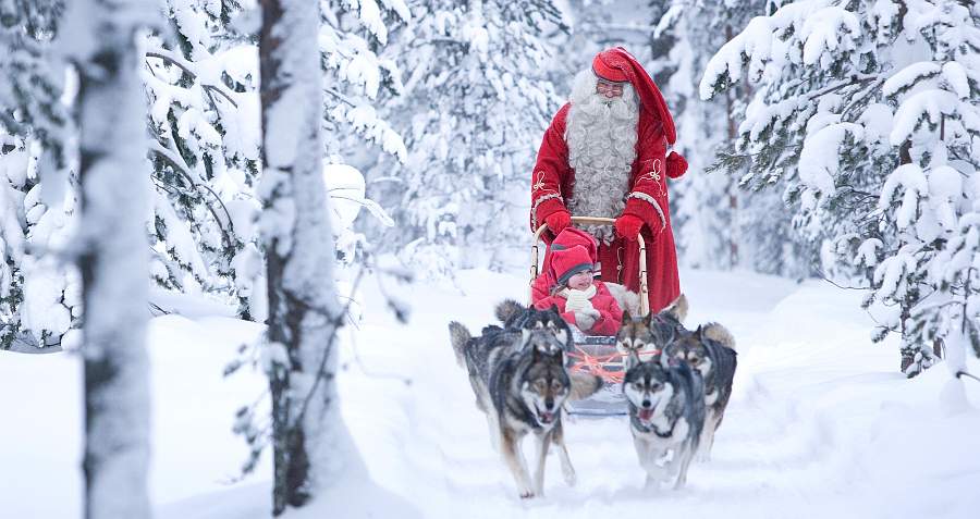 Santa Claus con husky